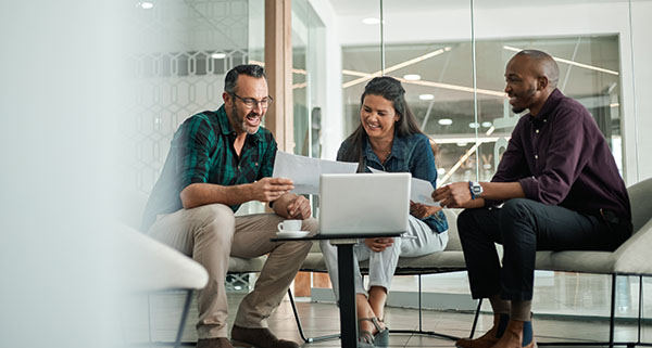 three people having a business consultation together